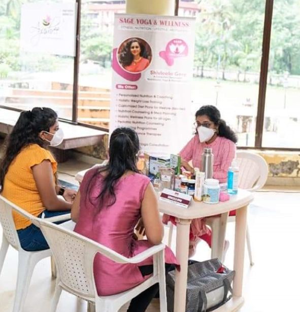 Dr. Shivleela Gore with patients at a Sage Naturopathy & Detox Clinic health camp